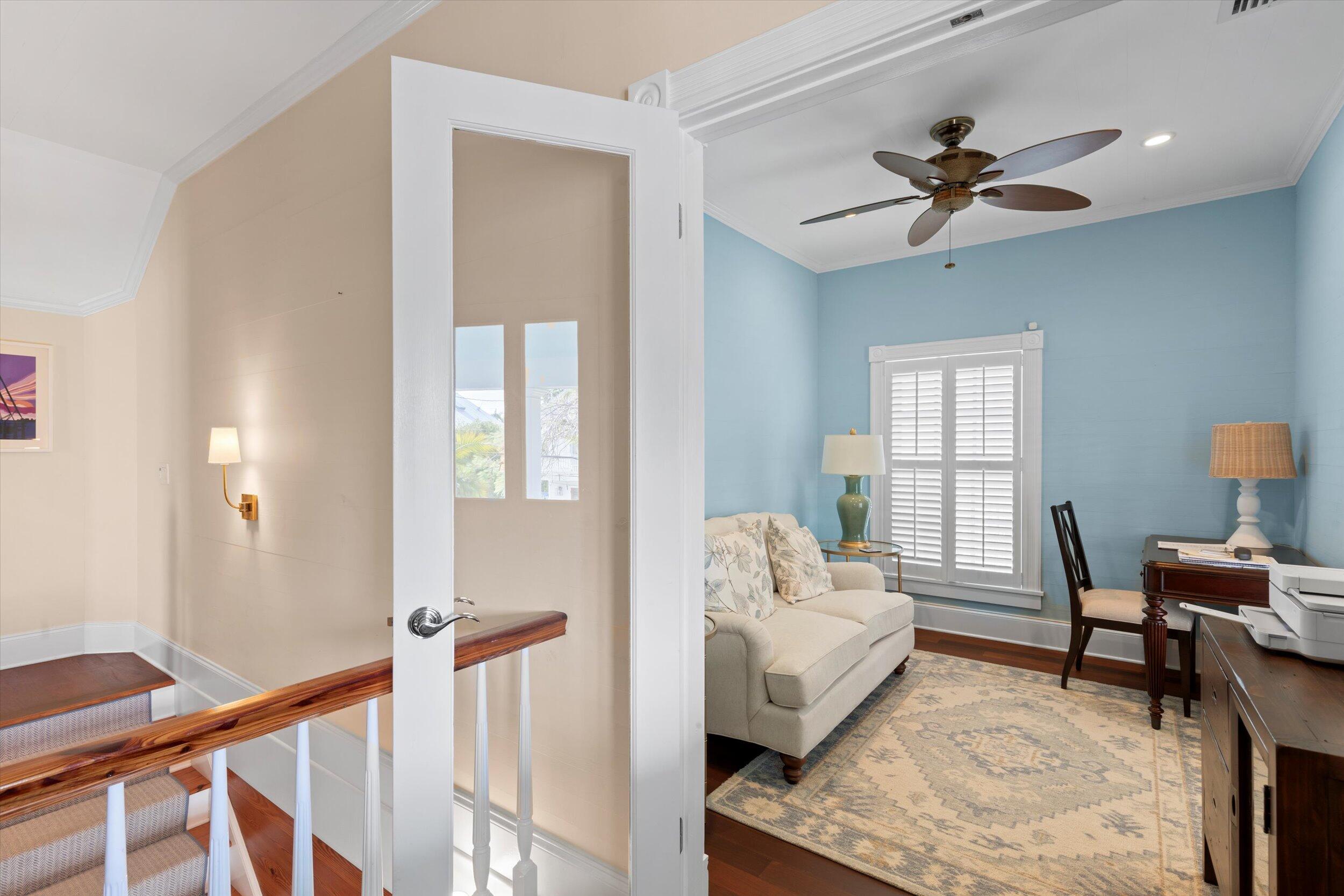 709 Eaton Street Key West, FL 33040 - Photo 32 of 37 a living room with furniture and a window