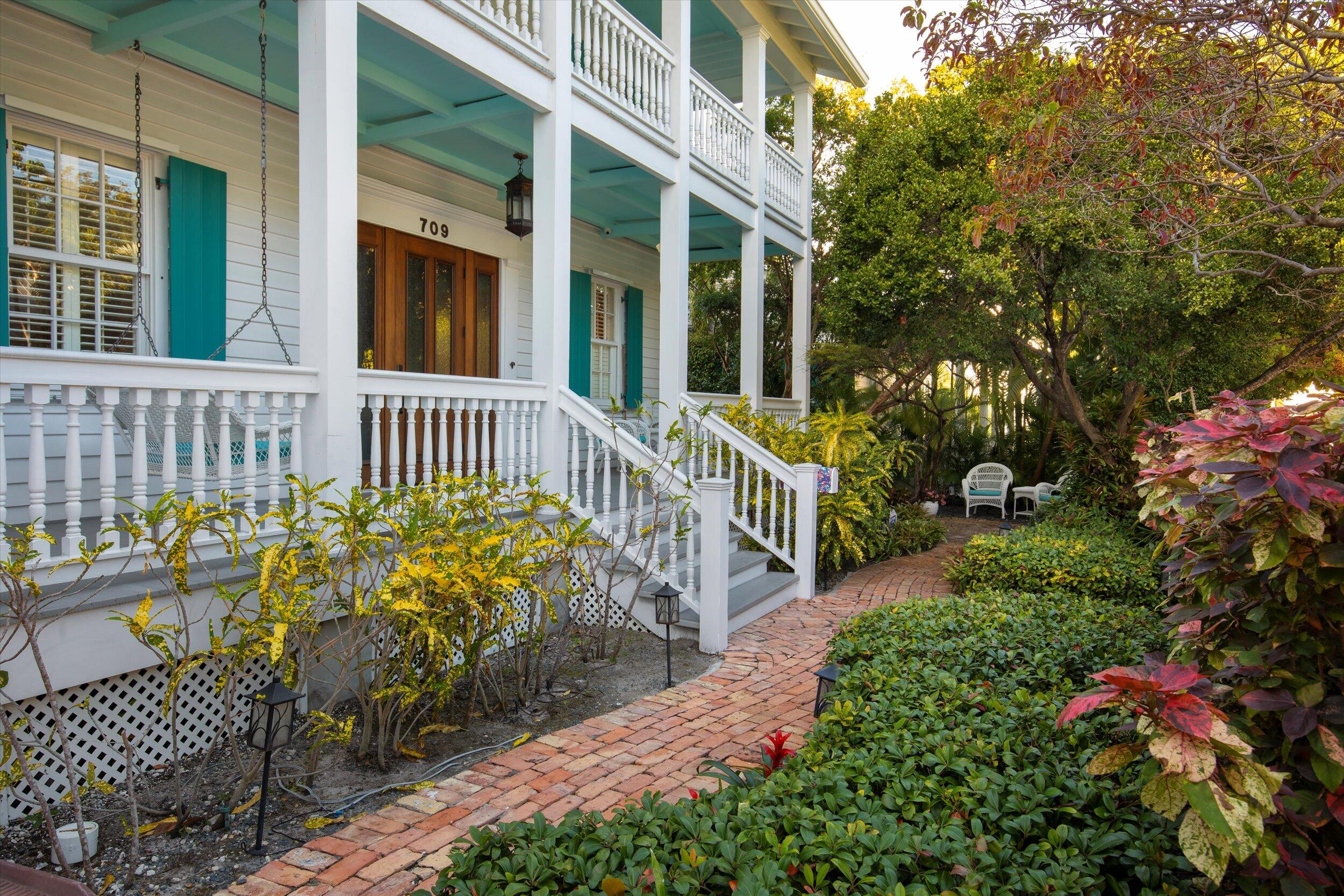 709 Eaton Street Key West, FL 33040 - Photo 33 of 37 a view of a chair and table in the patio