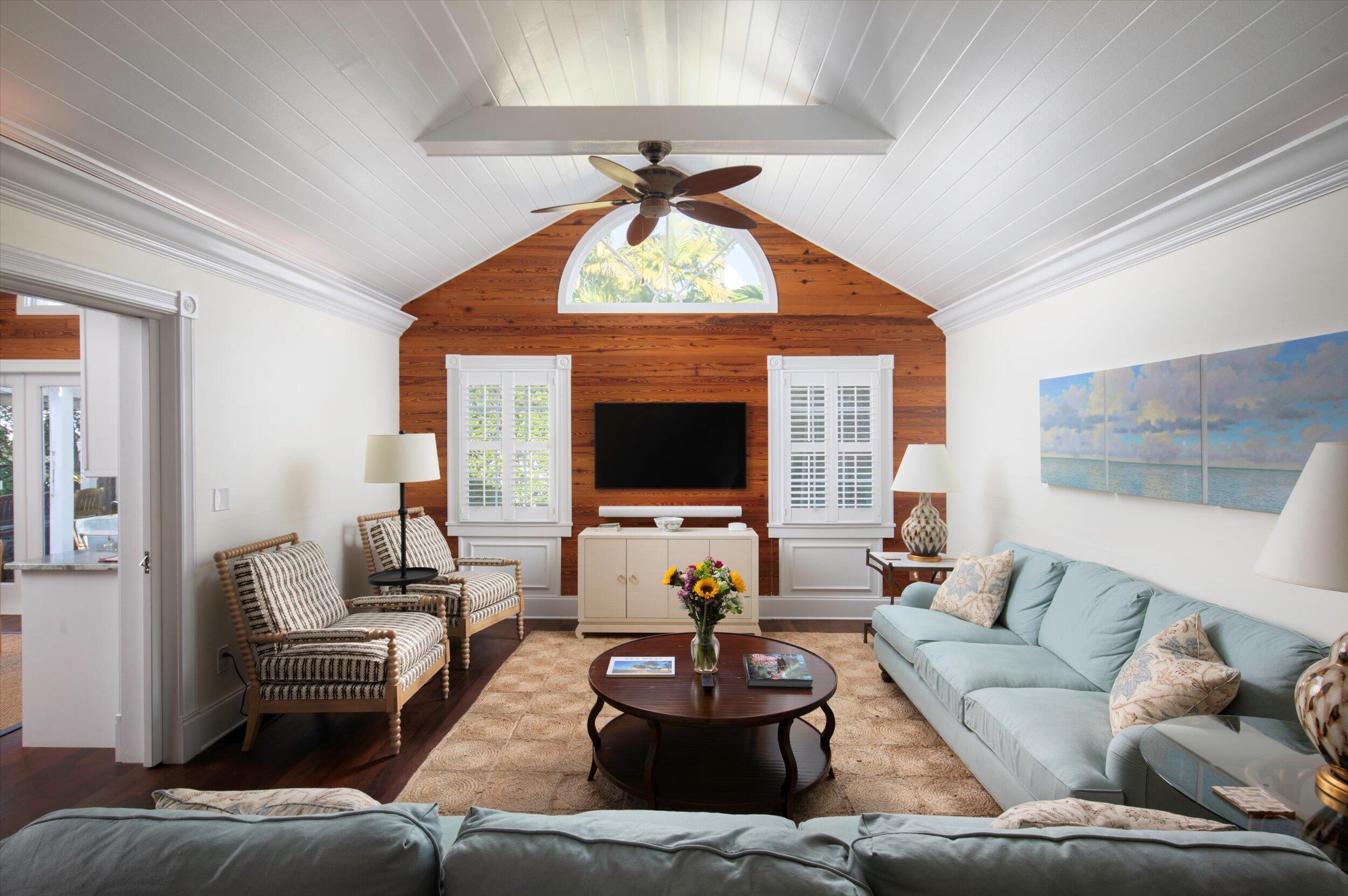 709 Eaton Street Key West, FL 33040 - Photo 5 of 37 a living room with furniture and a large window