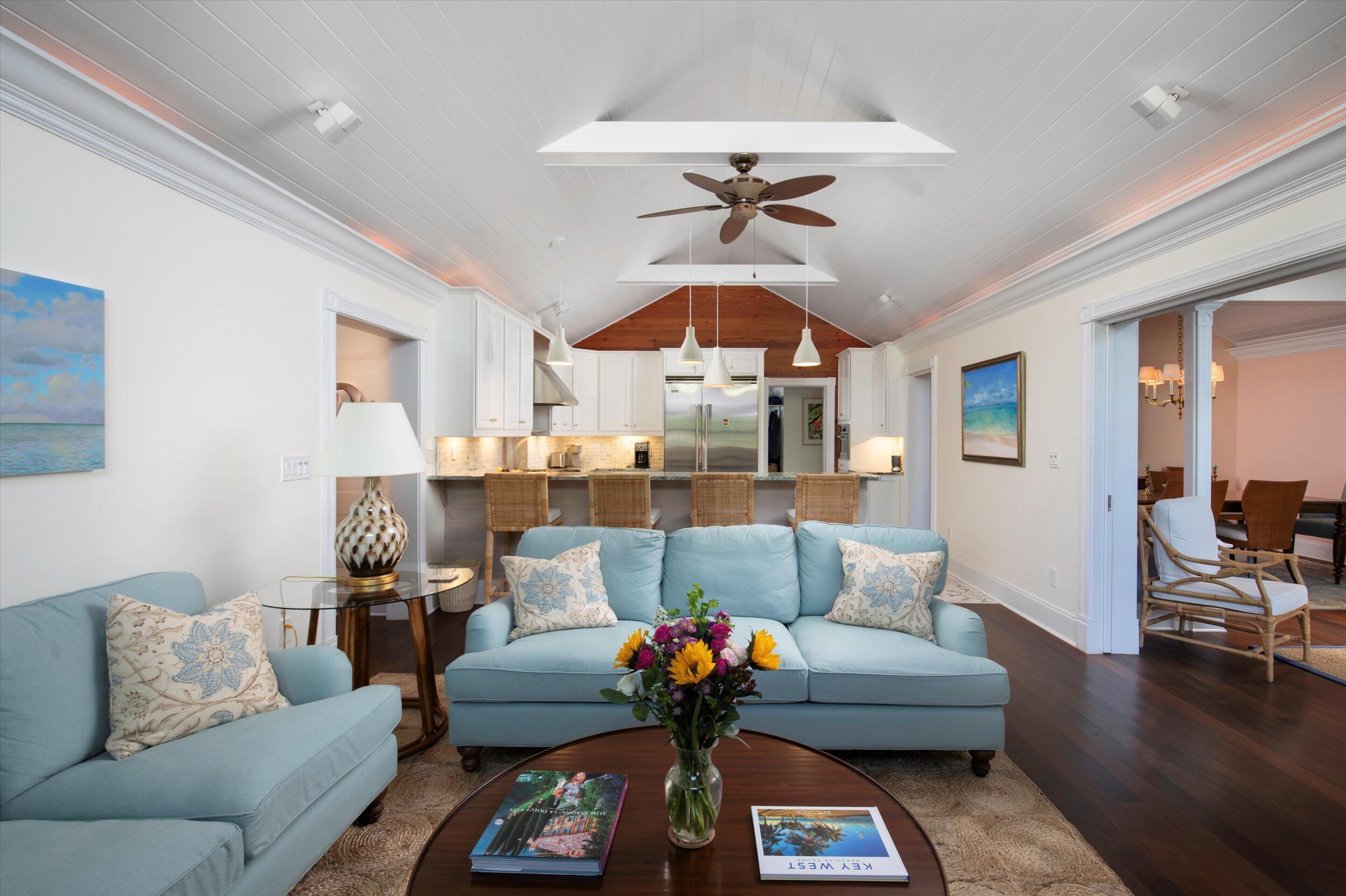 709 Eaton Street Key West, FL 33040 - Photo 6 of 37 a living room with furniture and wooden floor