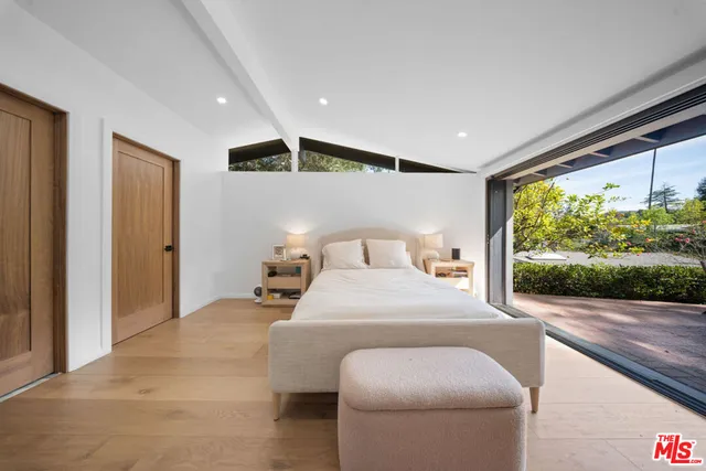 a view of a yard with an outdoor seating