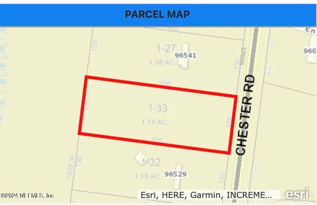 a view of a city with lush green forest