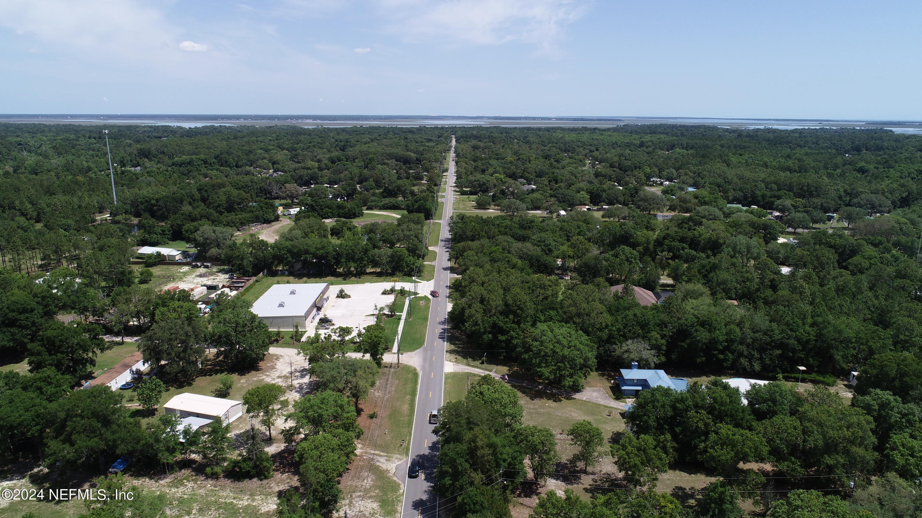 0 Chester Road Yulee, FL 32097 - Photo 6 of 12 an aerial view of a house with a yard