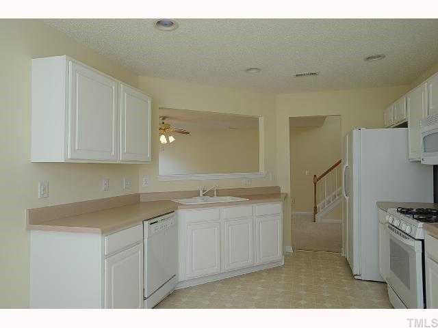 5101 Marathon Lane Raleigh, NC 27616 - Photo 2 of 11 a kitchen with a sink and refrigerator