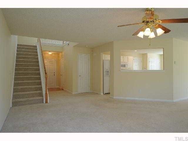 5101 Marathon Lane Raleigh, NC 27616 - Photo 5 of 11 a view of an empty room with wooden floor