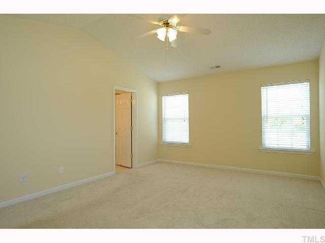 5101 Marathon Lane Raleigh, NC 27616 - Photo 6 of 11 a view of an empty room with a window