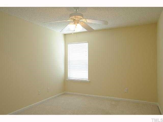 5101 Marathon Lane Raleigh, NC 27616 - Photo 8 of 11 a view of an empty room and window