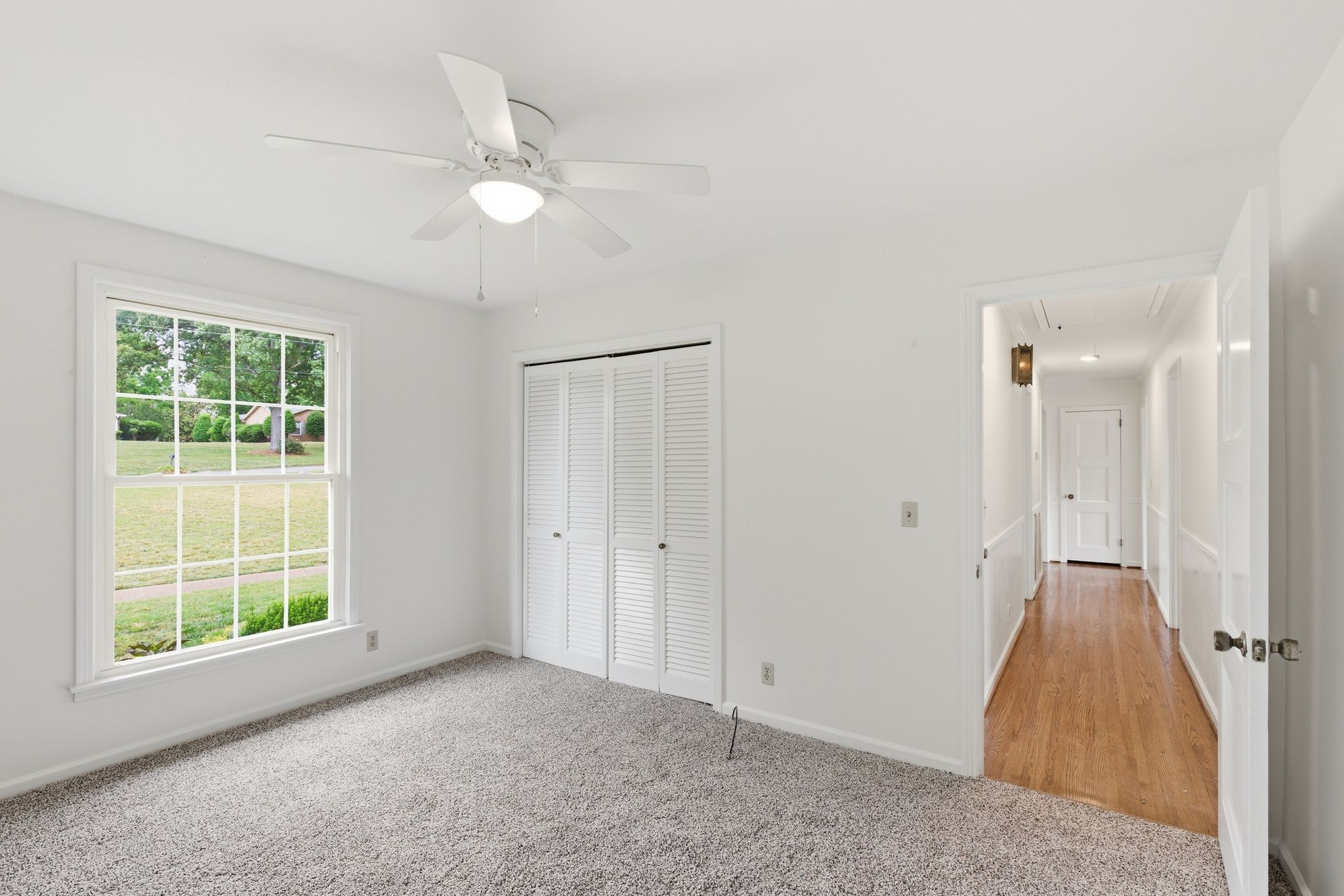 213 Rising Sun Lane Old Hickory, TN 37138 - Photo 24 of 37 an empty room with a ceiling fan and a window