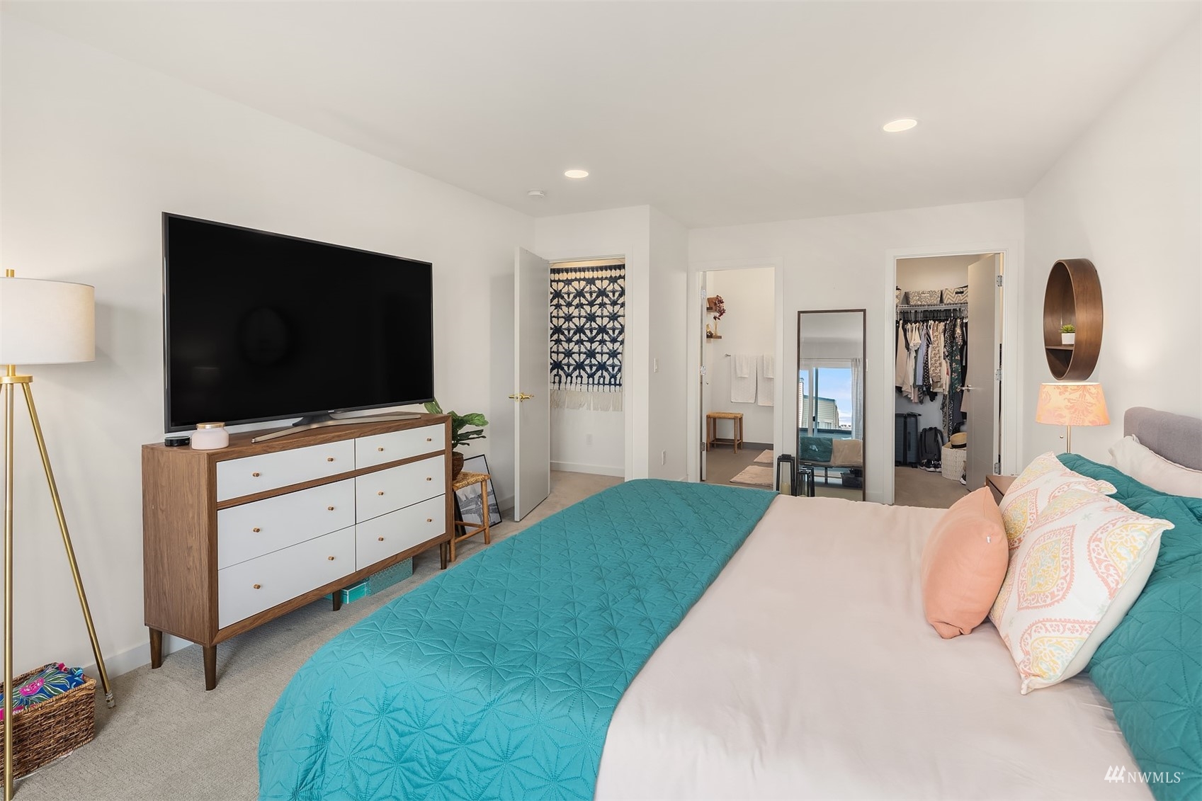 4209 Southwest Frontenac Street Seattle, WA 98136 - Photo 18 of 36 a bedroom with a flat screen tv on dresser and a flat screen tv