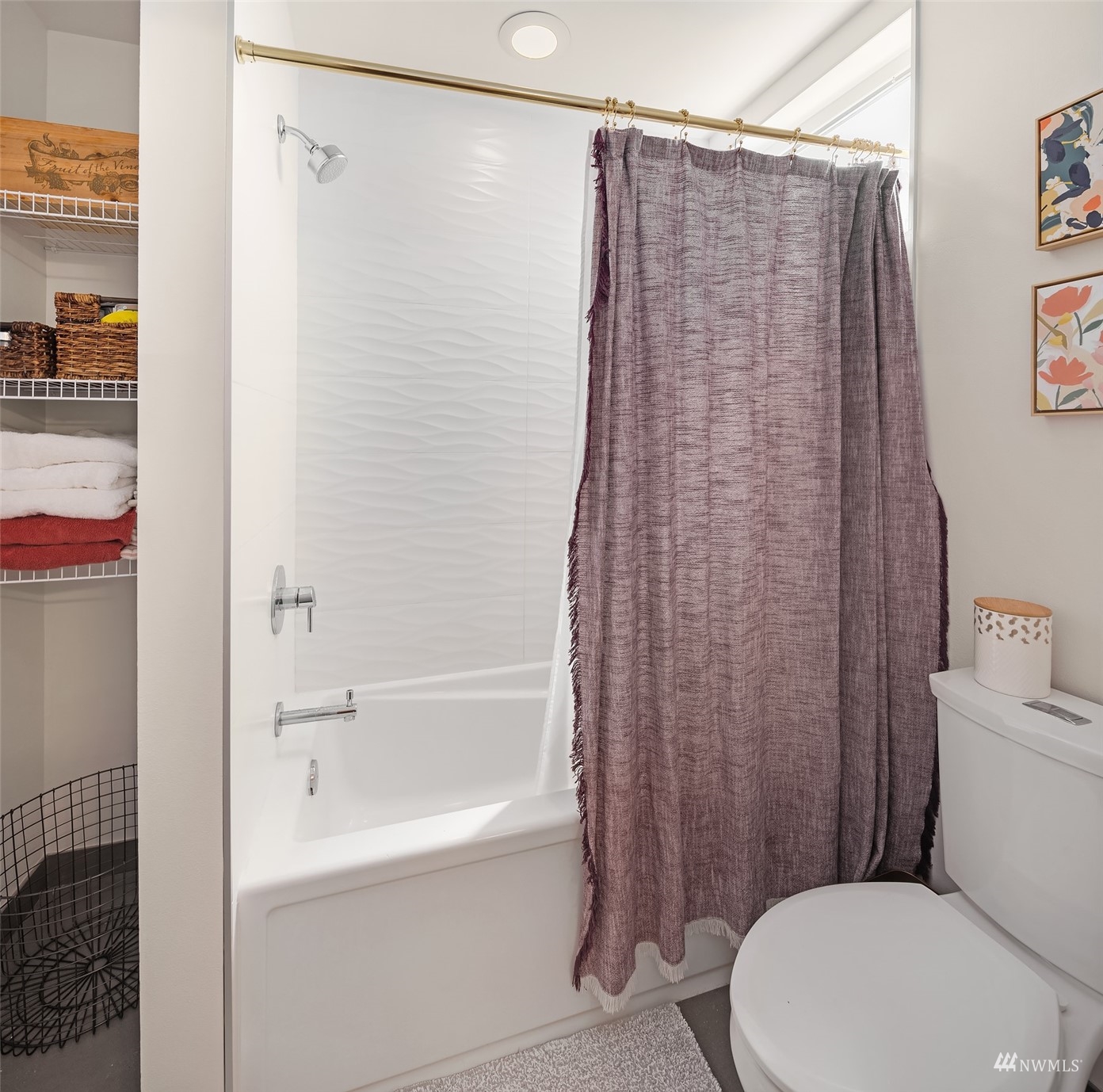 4209 Southwest Frontenac Street Seattle, WA 98136 - Photo 20 of 36 a white toilet sitting next to a bath tub