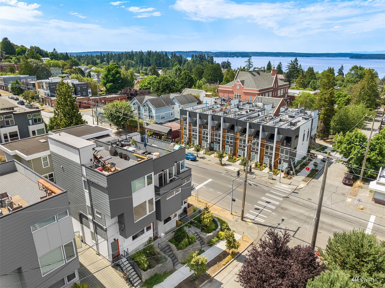 4209 Southwest Frontenac Street Seattle, WA 98136 - Photo 2 of 36 an aerial view of a house with a garden