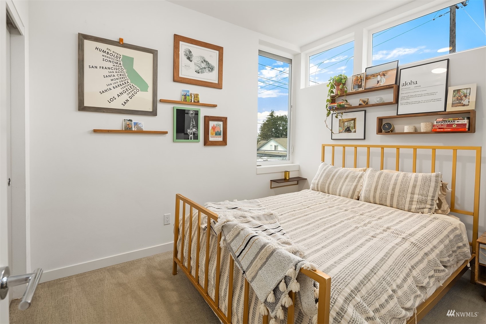 4209 Southwest Frontenac Street Seattle, WA 98136 - Photo 22 of 36 a bedroom with a bed and a window