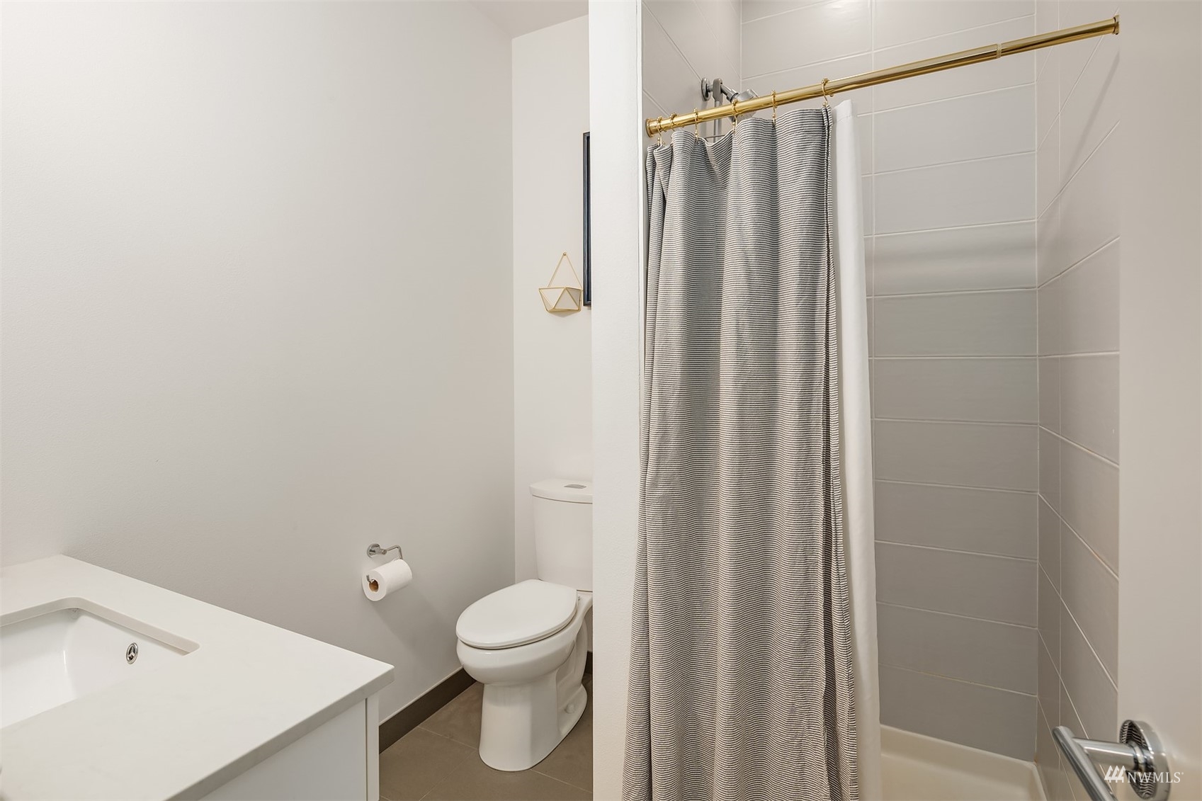 4209 Southwest Frontenac Street Seattle, WA 98136 - Photo 23 of 36 a bathroom with a shower and a toilet