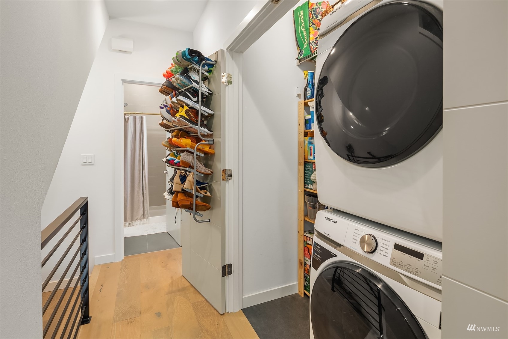 4209 Southwest Frontenac Street Seattle, WA 98136 - Photo 26 of 36 a view of a storage & utility room with washer and dryer