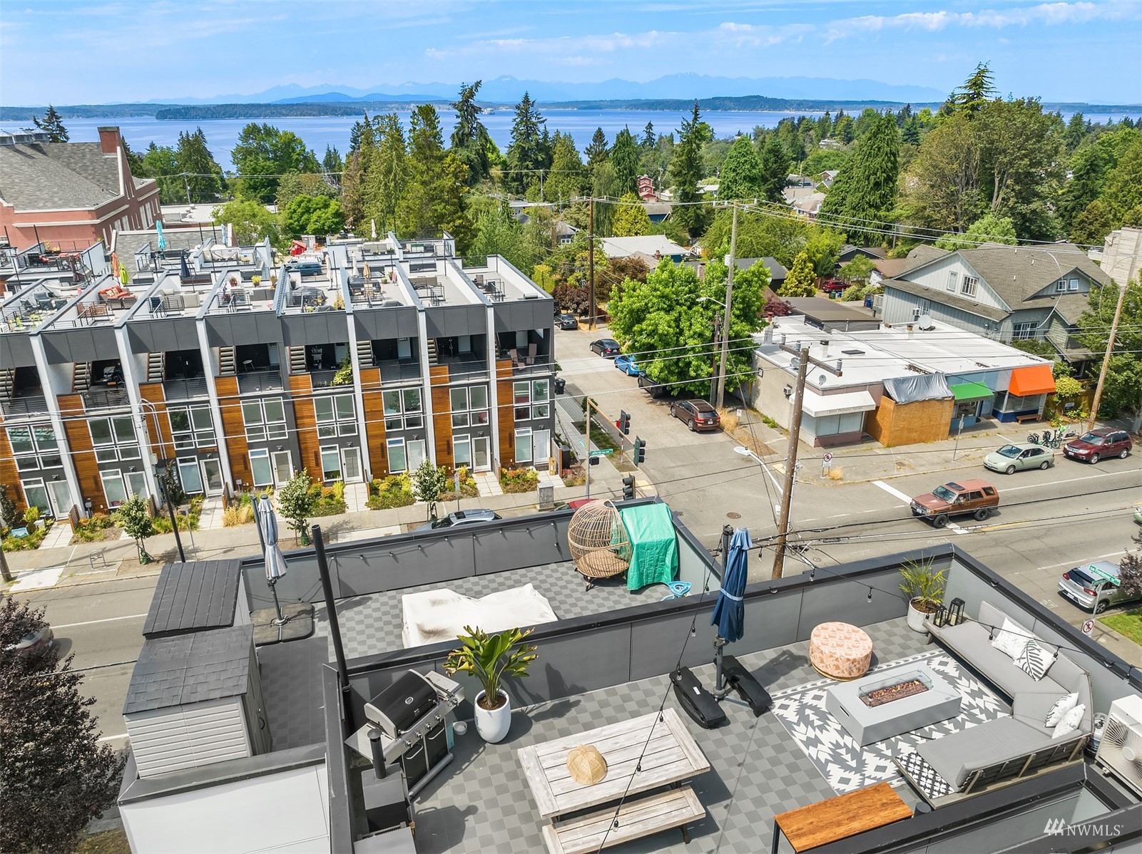 4209 Southwest Frontenac Street Seattle, WA 98136 - Photo 3 of 36 a view of a chairs and table in a patio