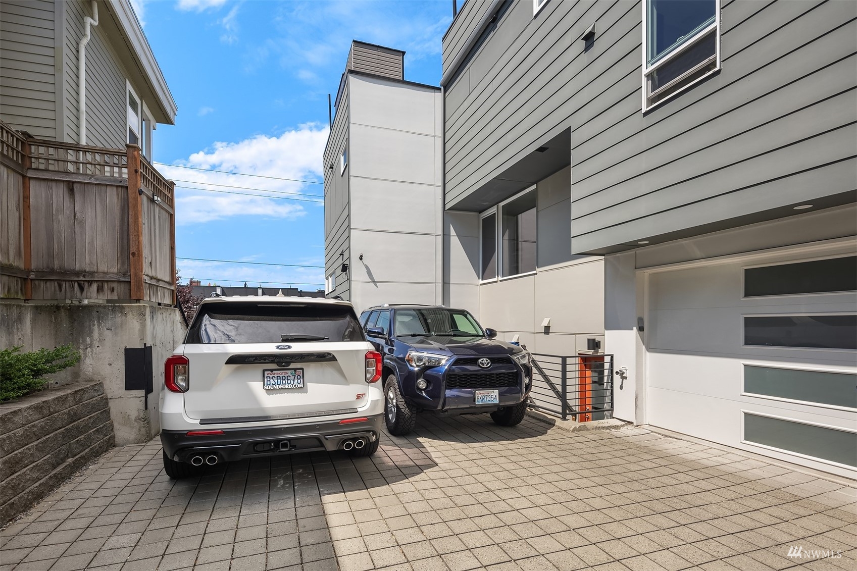 4209 Southwest Frontenac Street Seattle, WA 98136 - Photo 34 of 36 a view of a car in front of building