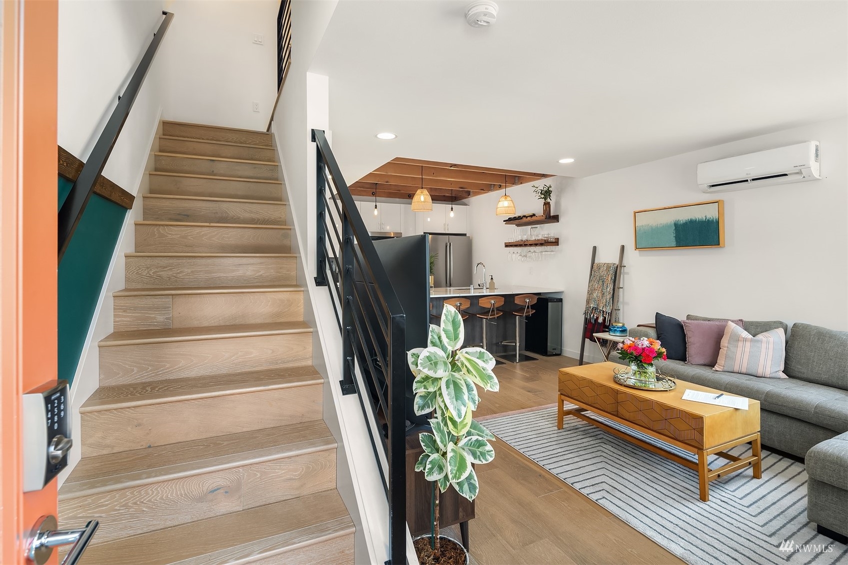 4209 Southwest Frontenac Street Seattle, WA 98136 - Photo 9 of 36 a living room with furniture and a fireplace