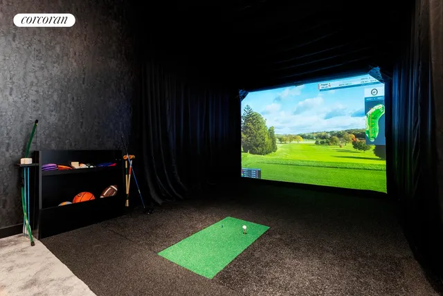 a backyard of a house with a garden and outdoor seating