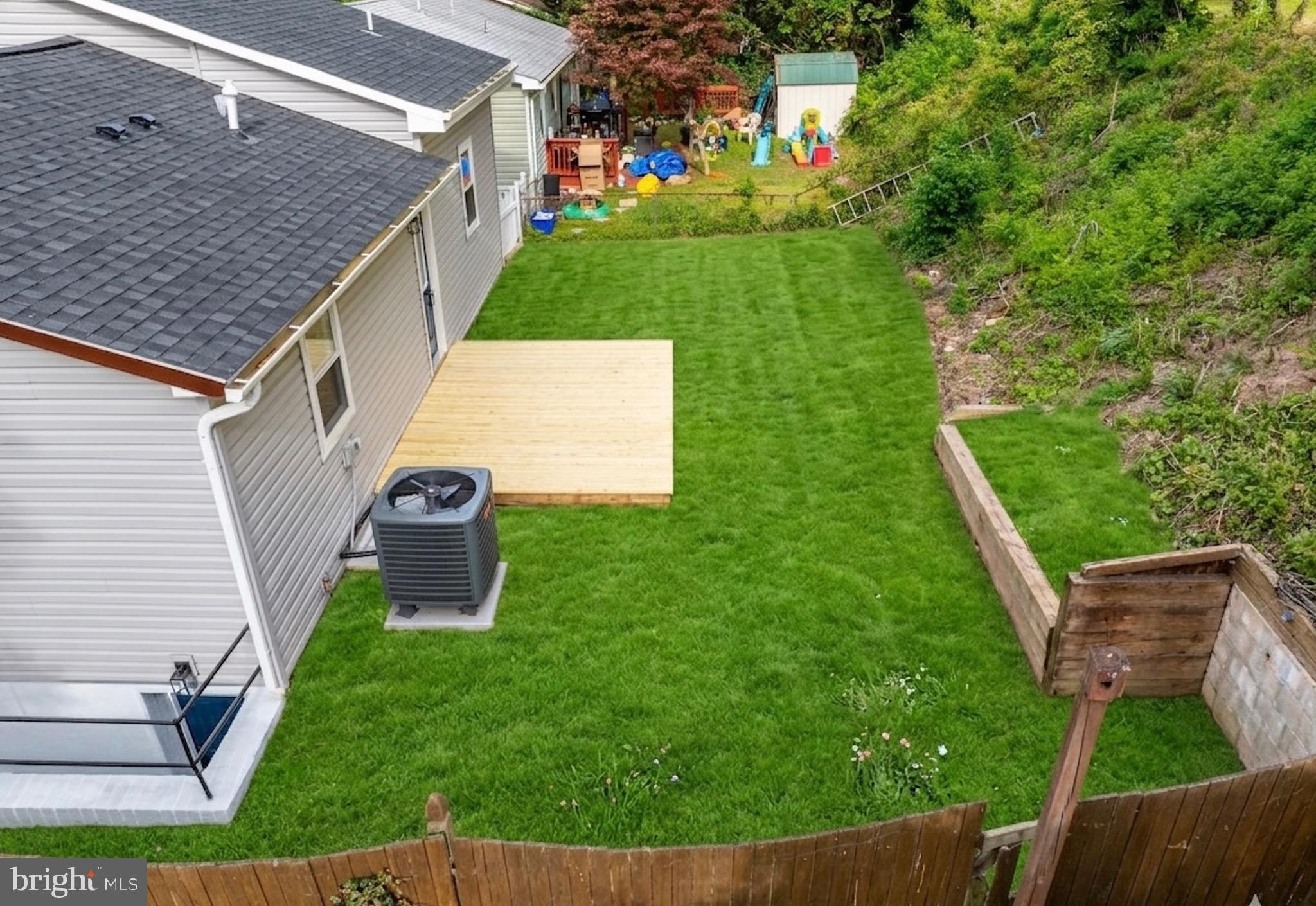 803 Johnson Avenue Silver Spring, MD 20904 - Photo 15 of 20 a view of a backyard with sitting area