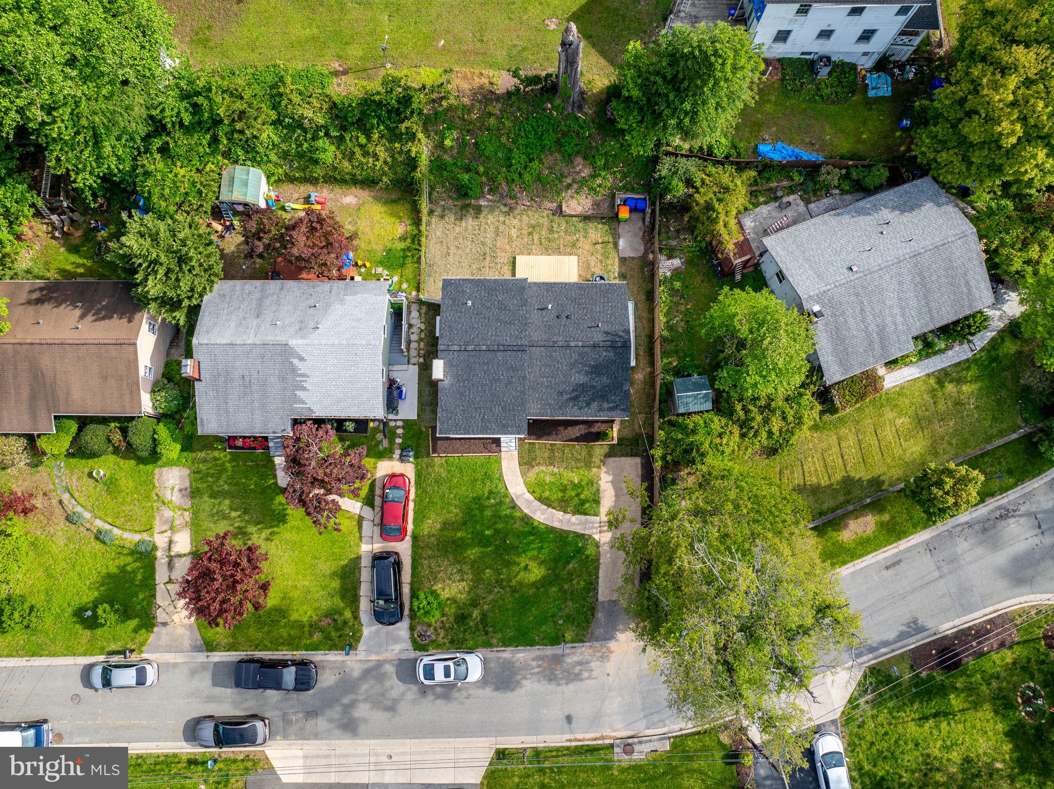 803 Johnson Avenue Silver Spring, MD 20904 - Photo 16 of 20 an aerial view of a house with a yard and garden