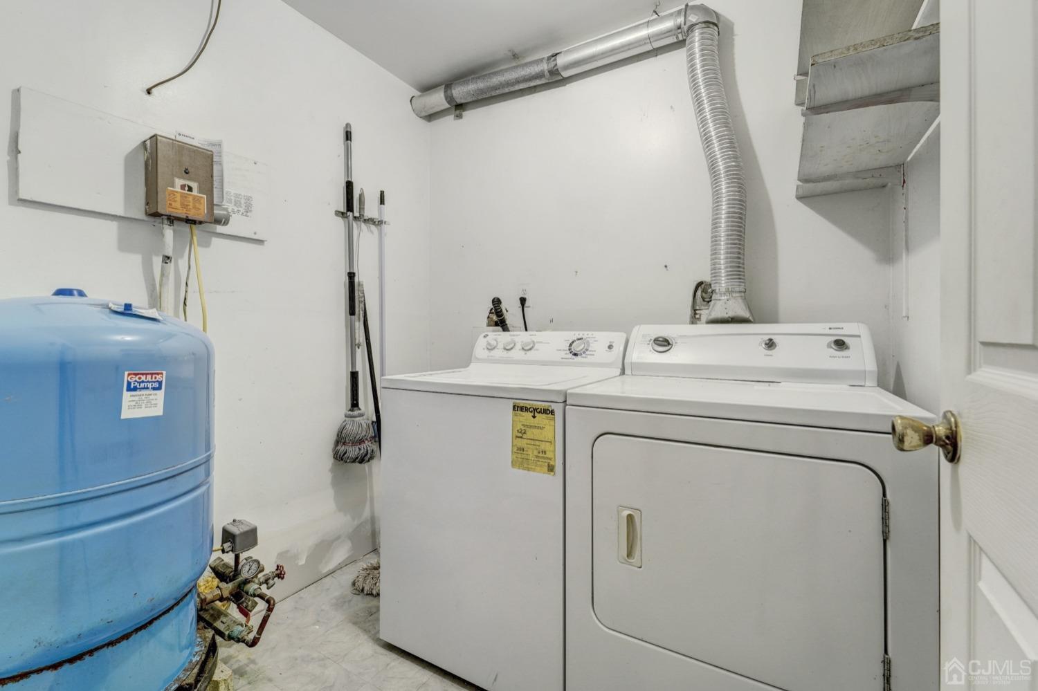 23 Hillside Terrace Andover, NJ 07821 - Photo 16 of 20 a utility room with dryer and washer