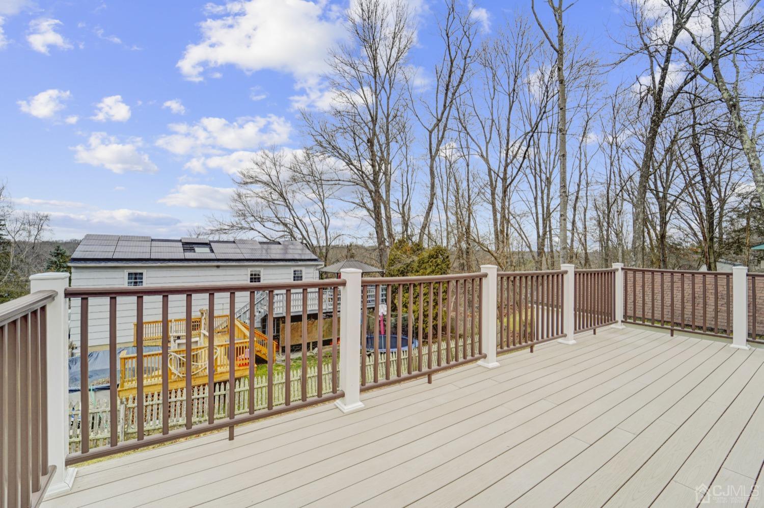 23 Hillside Terrace Andover, NJ 07821 - Photo 19 of 20 a balcony with wooden floor and city view