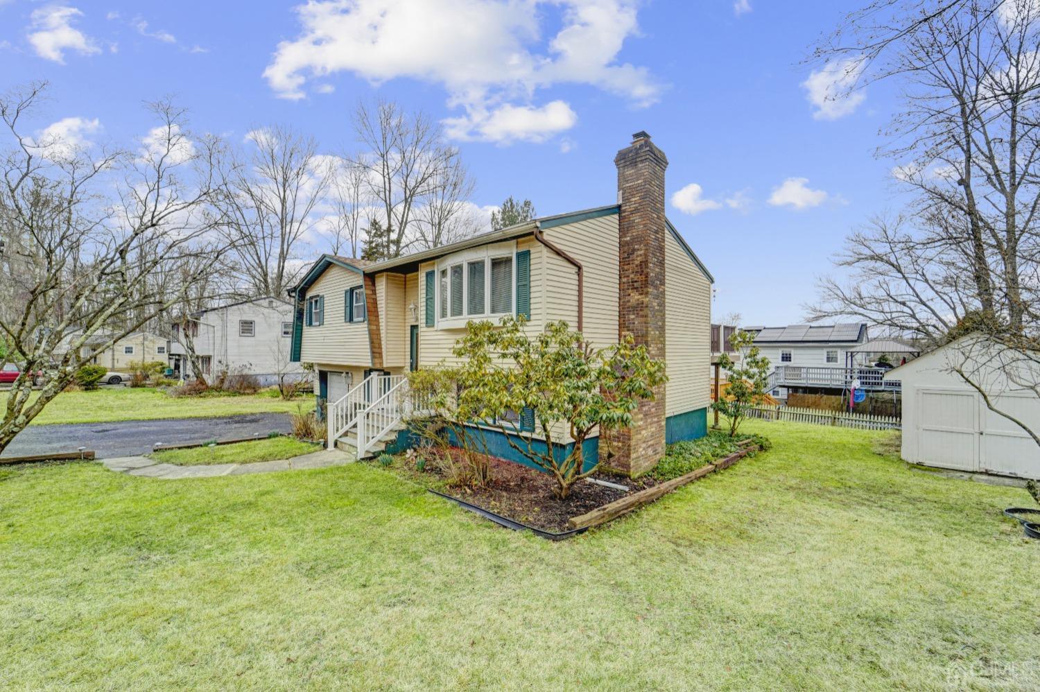 23 Hillside Terrace Andover, NJ 07821 - Photo 2 of 20 a front view of a house with a yard