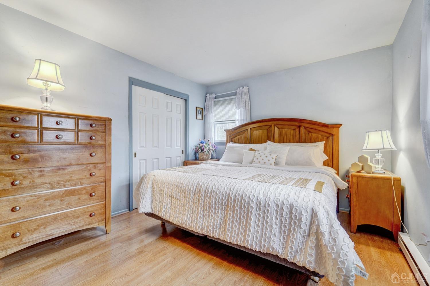 23 Hillside Terrace Andover, NJ 07821 - Photo 6 of 20 a bedroom with a bed a window and dresser