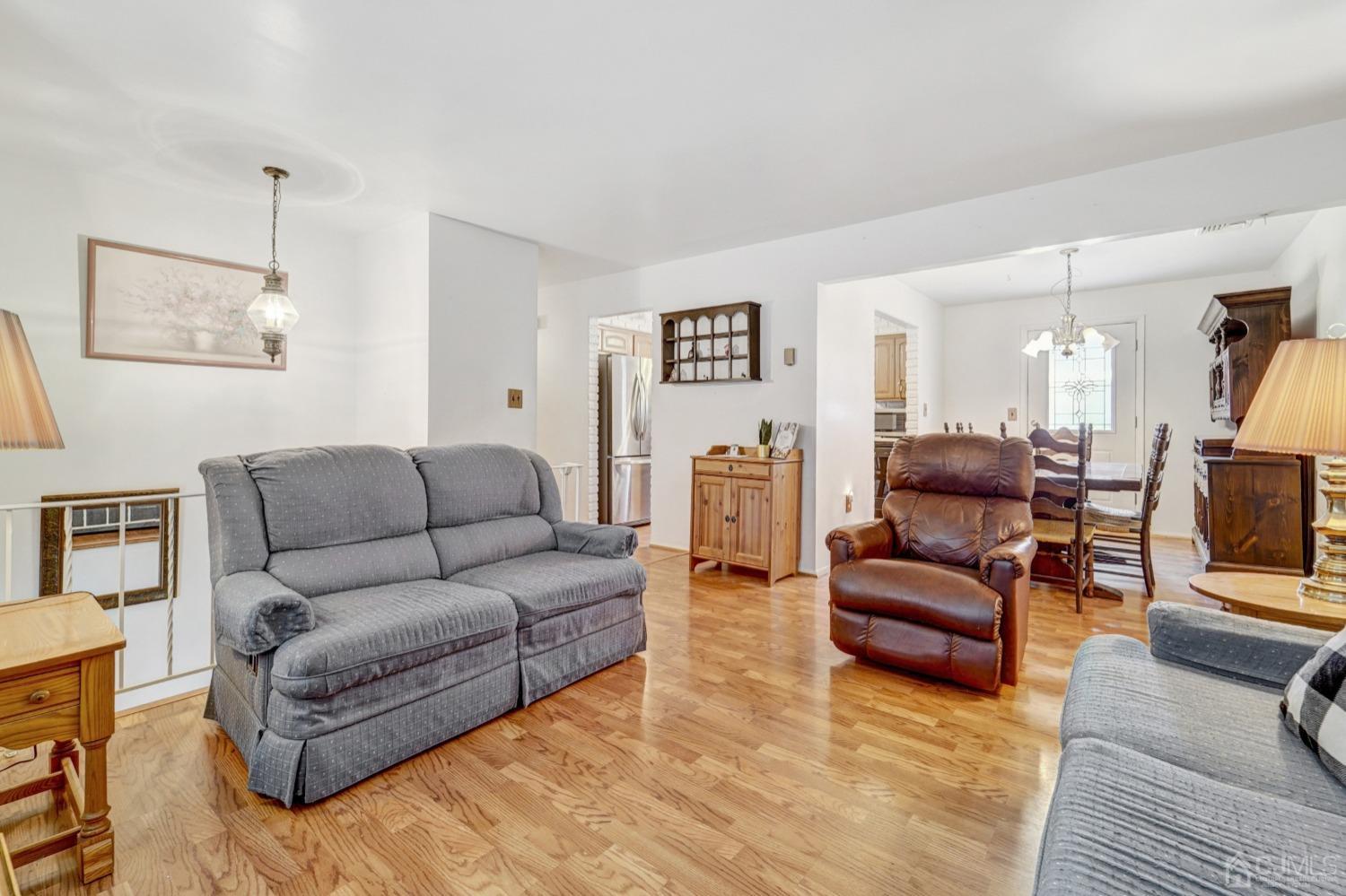 23 Hillside Terrace Andover, NJ 07821 - Photo 9 of 20 a living room with furniture and a couch