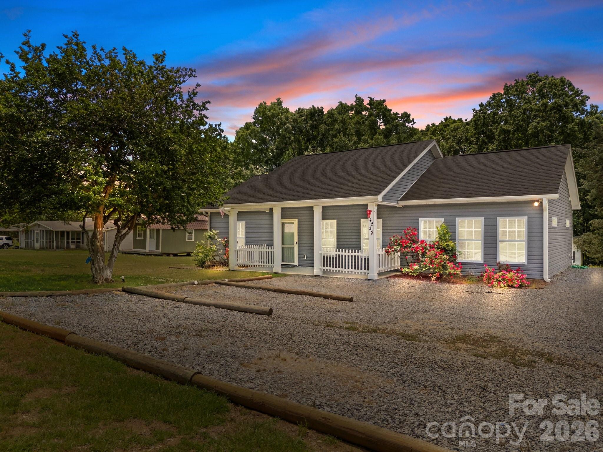 14532 East Rocky River Road Davidson, NC 28036 - Photo 3 of 32 a view of a house with backyard