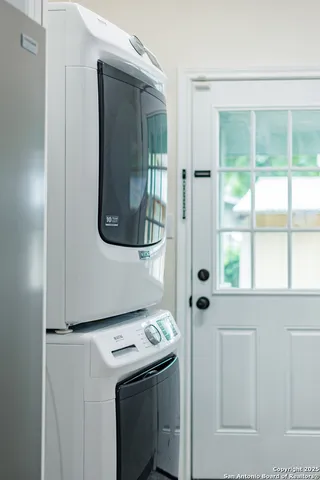 a utility room with dryer and washer