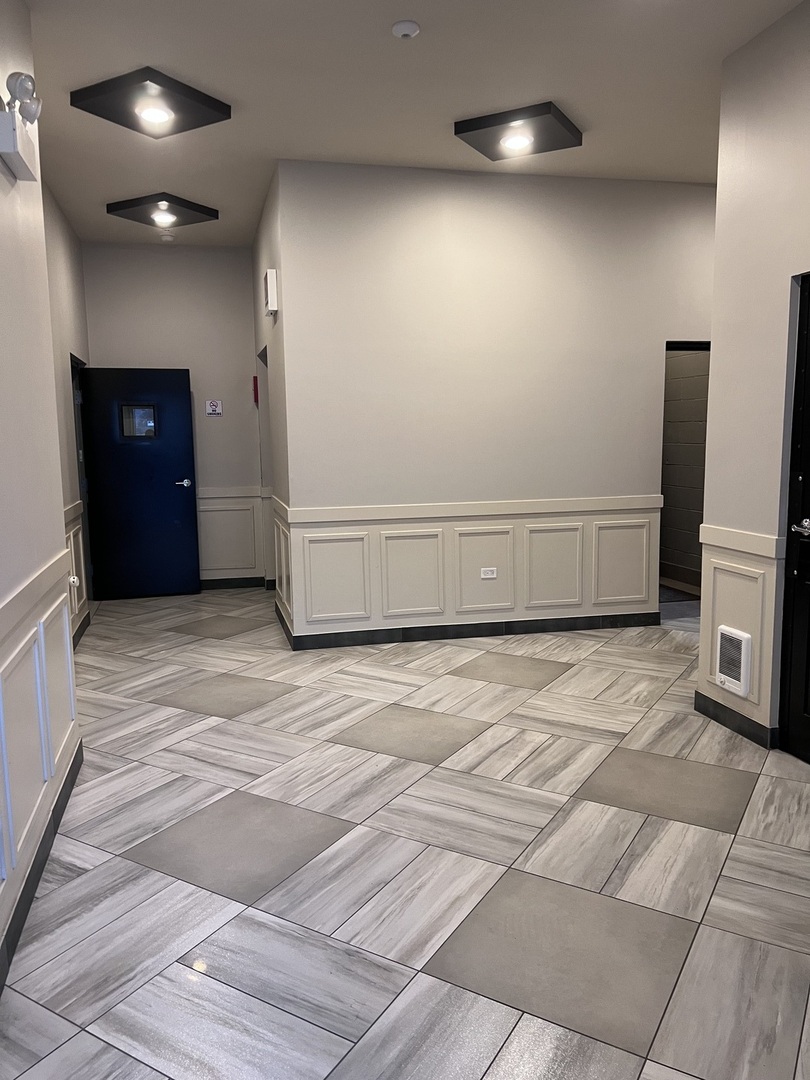 1208 East 64th Street, Unit 2B Chicago, IL 60637 - Photo 2 of 19 a view of empty room