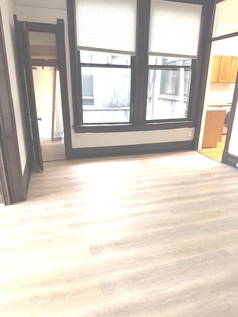 2150 North Halsted Street, Unit 3F Chicago, IL 60614 - Photo 13 of 16 a view of an empty room with a window