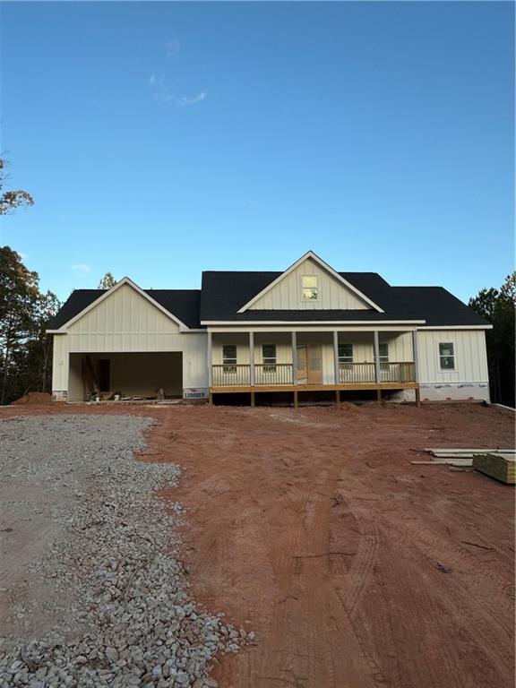 a front view of a house with a yard and balcony