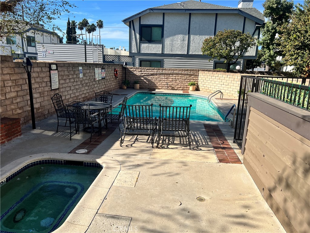 19230 Wyandotte Street, Unit 14 Reseda, CA 91335 - Photo 3 of 10 a view of house with patio outdoor seating space