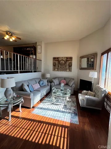 a living room with furniture and a couch