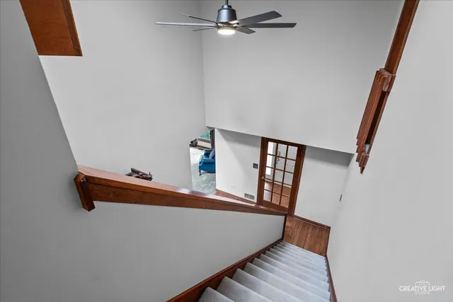 a view of a hallway with staircase