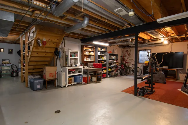 a view of a bike storage and utility room