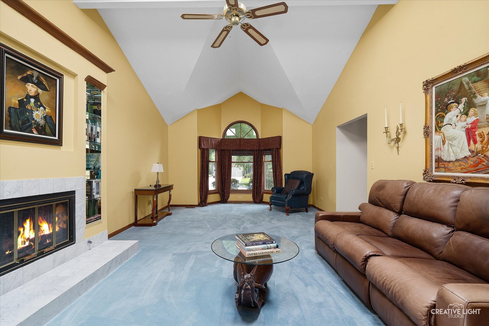 567 Roxbury Drive Naperville, IL 60565 - Photo 7 of 36 a living room with furniture and a fireplace