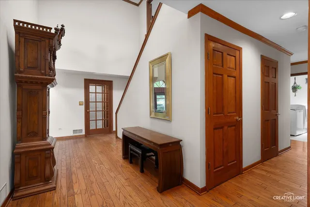 a view of livingroom with hardwood floor and hallway