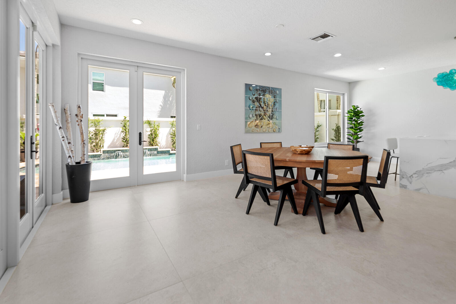 4267 Northwest 65th Place Boca Raton, FL 33496 - Photo 12 of 80 a dining room with furniture and window