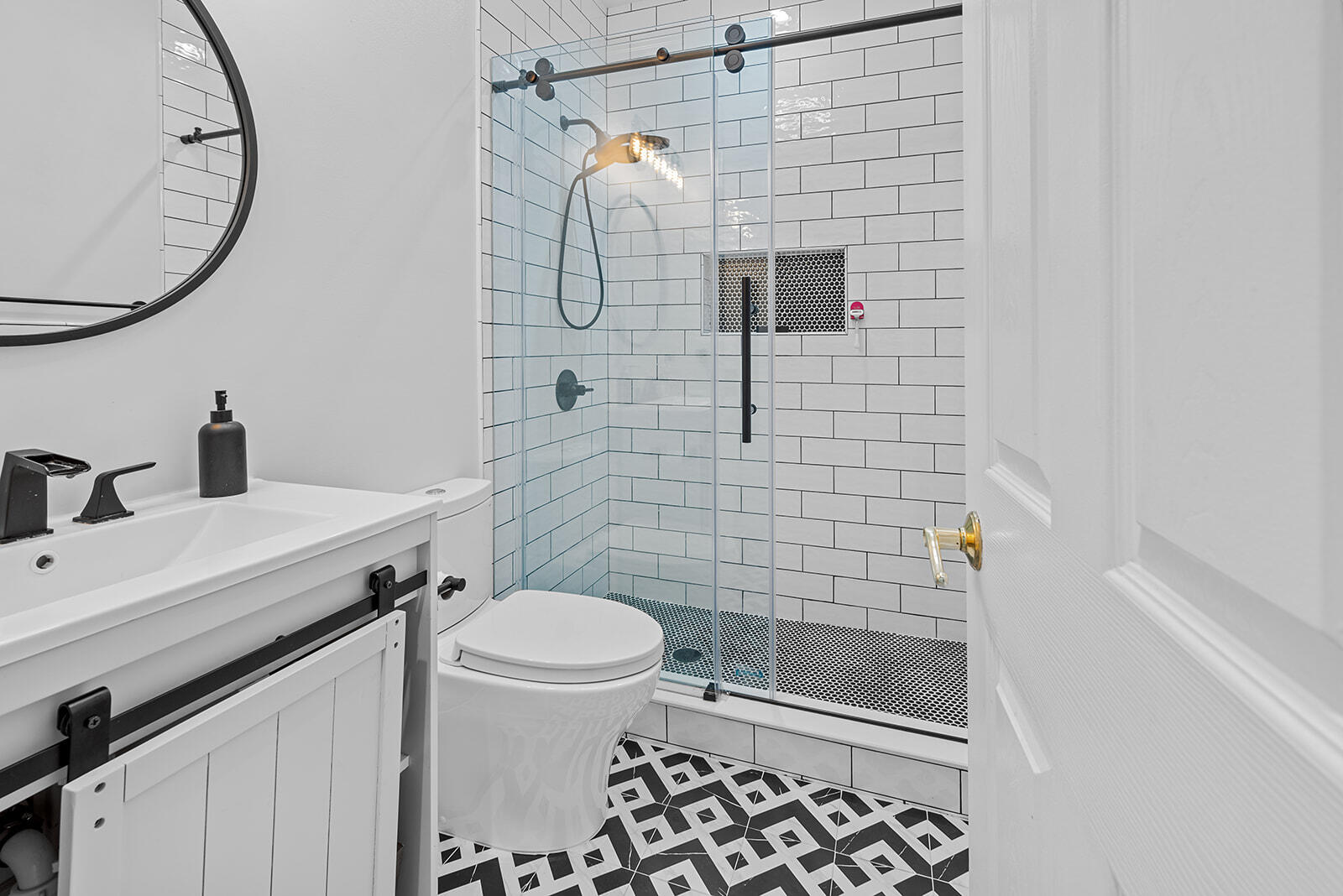 4267 Northwest 65th Place Boca Raton, FL 33496 - Photo 43 of 80 a bathroom with a sink toilet and shower