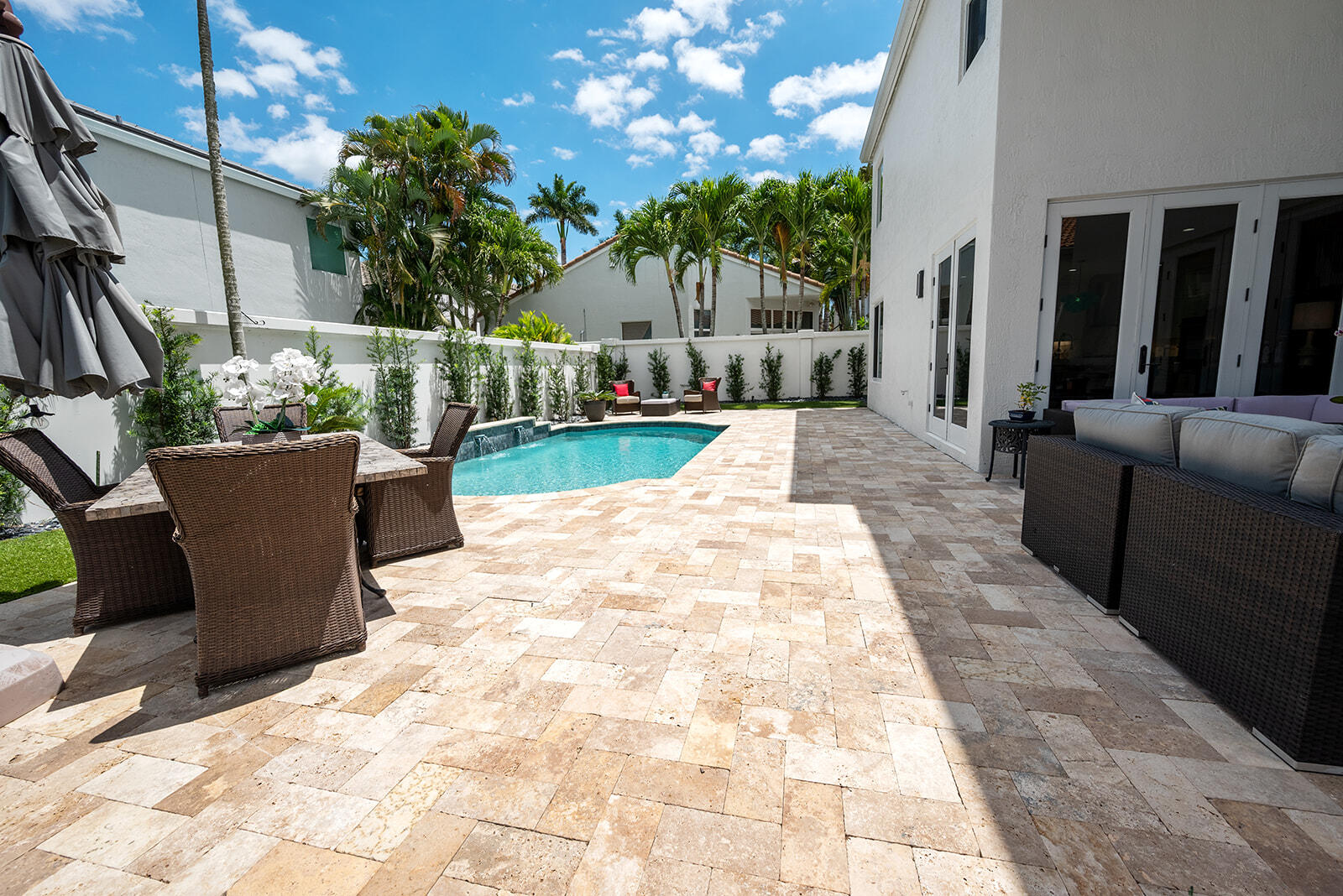 4267 Northwest 65th Place Boca Raton, FL 33496 - Photo 50 of 80 a view of a house with backyard and sitting area