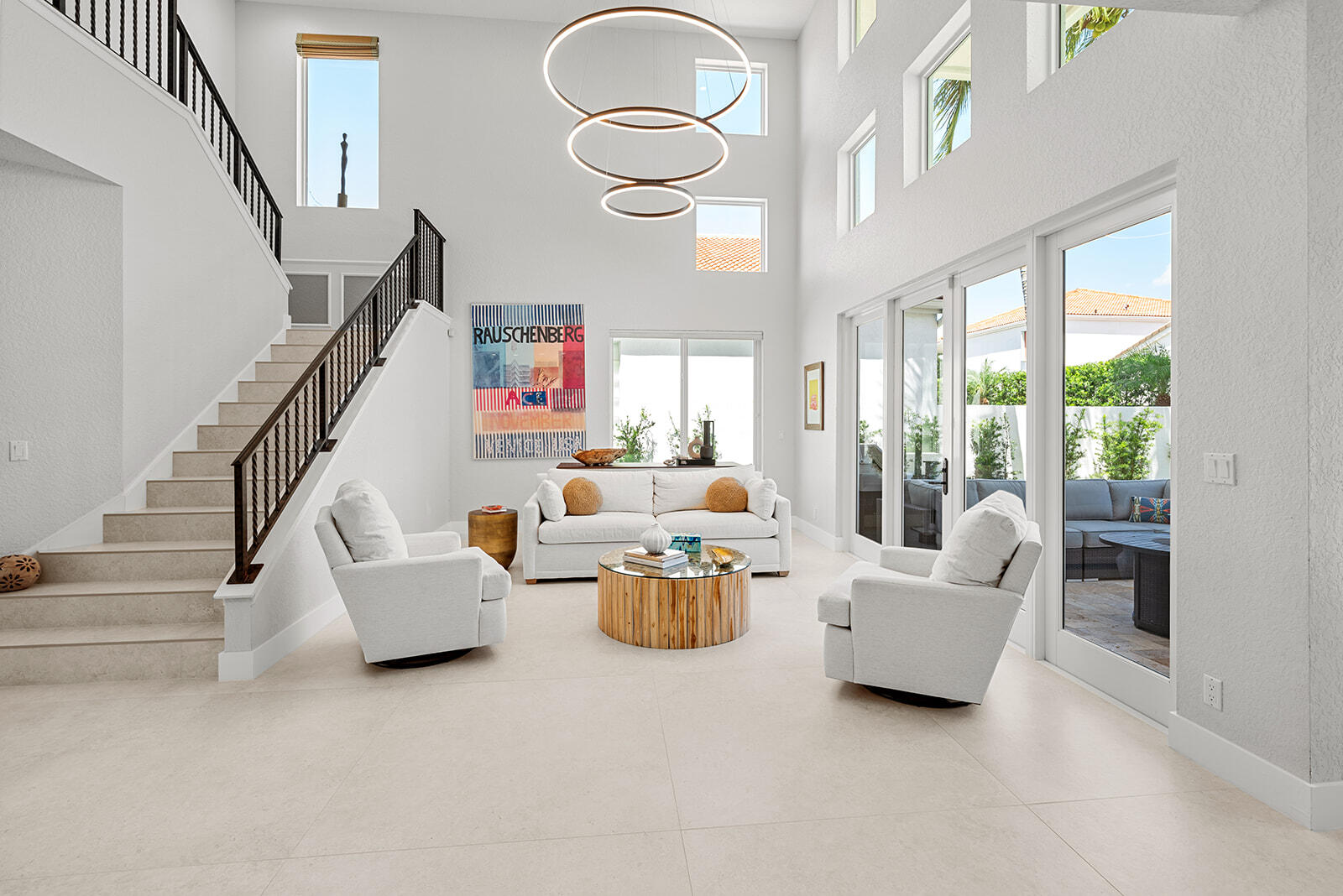 4267 Northwest 65th Place Boca Raton, FL 33496 - Photo 6 of 80 a living room with furniture and a floor to ceiling window