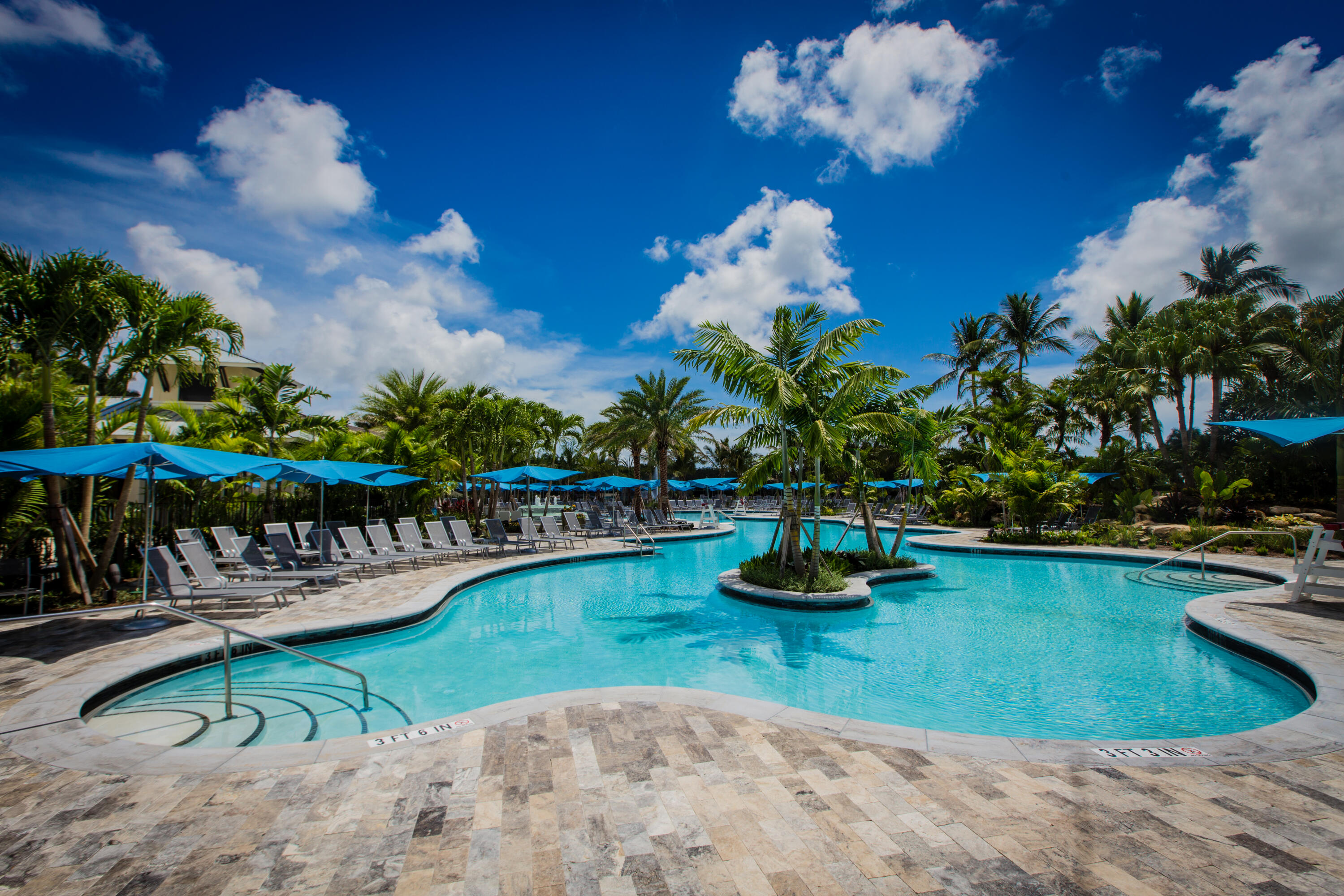 4267 Northwest 65th Place Boca Raton, FL 33496 - Photo 66 of 80 a view of a swimming pool with a patio