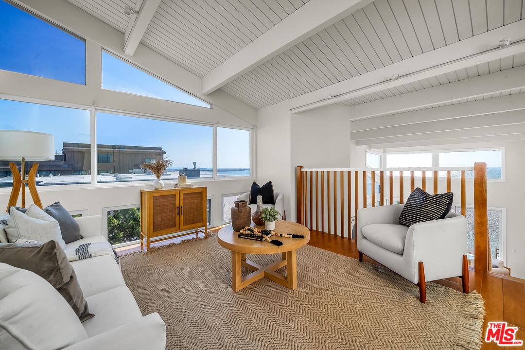 4 Lighthouse Street, Unit 13 Marina del Rey, CA 90292 - Photo 12 of 35 a living room with furniture and a couch