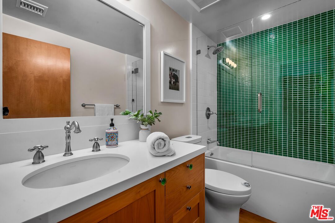 4 Lighthouse Street, Unit 13 Marina del Rey, CA 90292 - Photo 26 of 35 a bathroom with a sink a toilet and shower