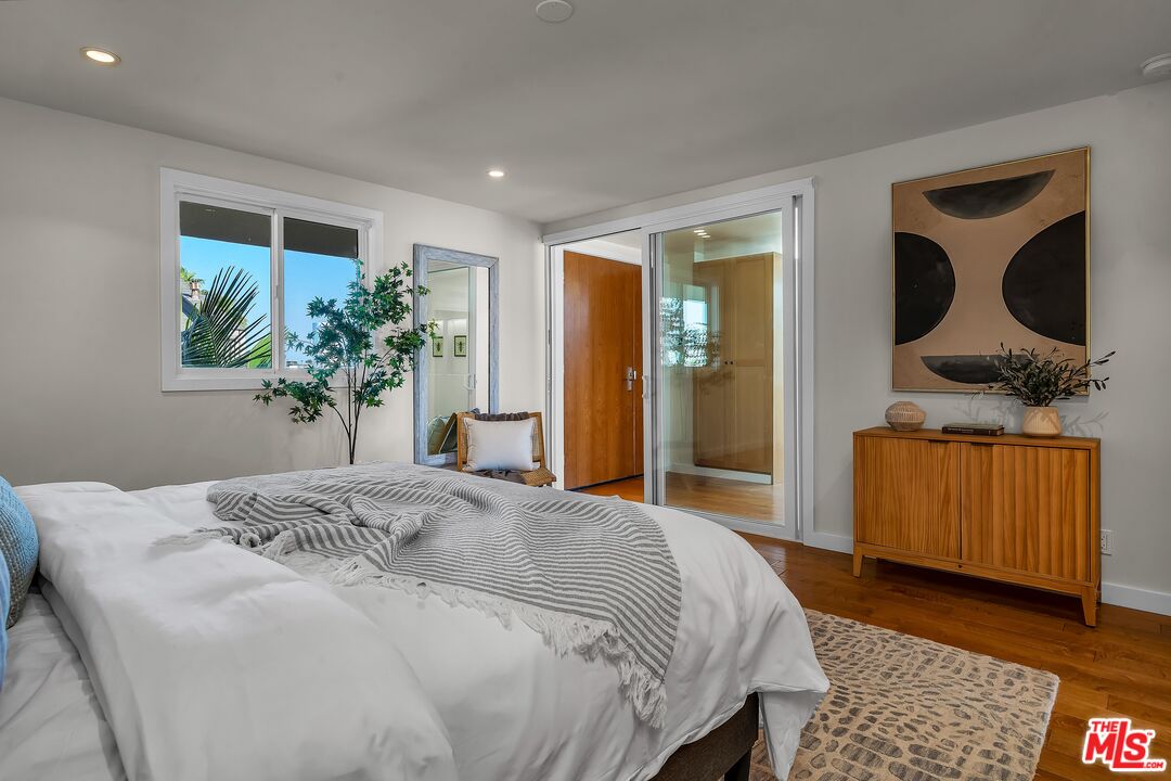 4 Lighthouse Street, Unit 13 Marina del Rey, CA 90292 - Photo 27 of 35 a bedroom with bed and dresser