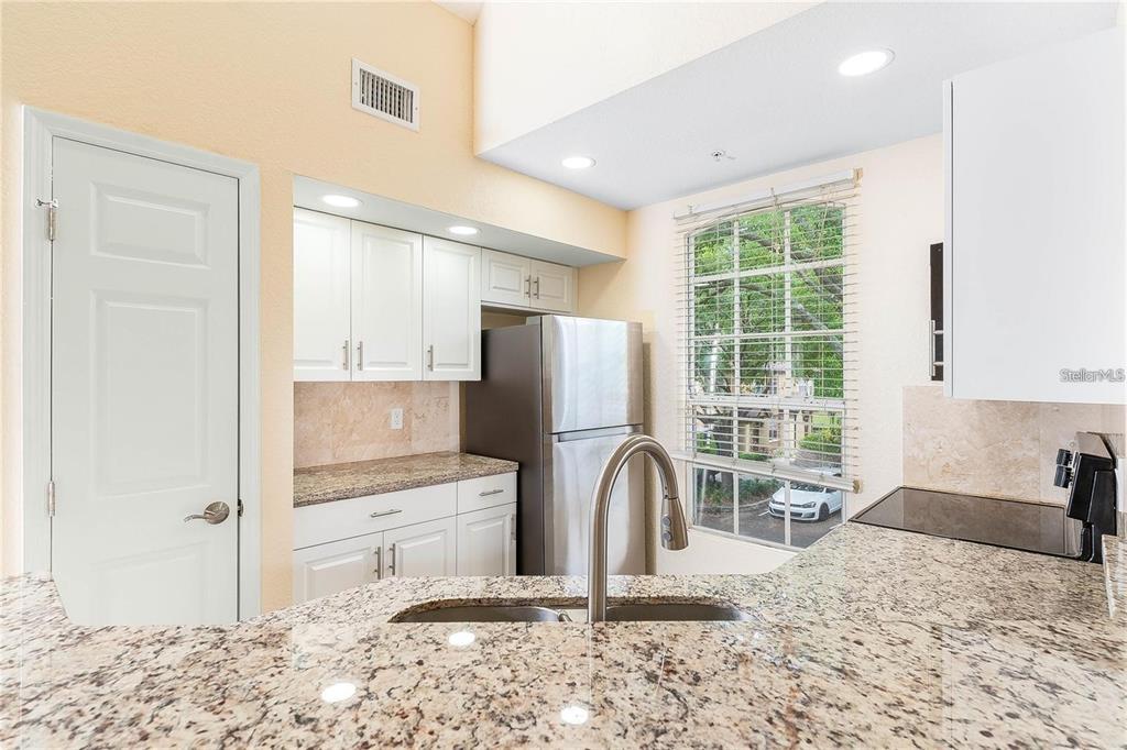 6308 Raleigh Street, Unit 311 Orlando, FL 32835 - Photo 4 of 26