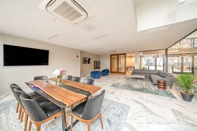 a view of a dining room with furniture